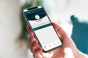 Person using eRSP home care software on mobile phone